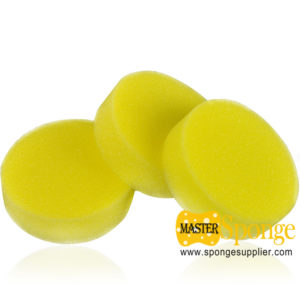 yellow round car waxing sponge